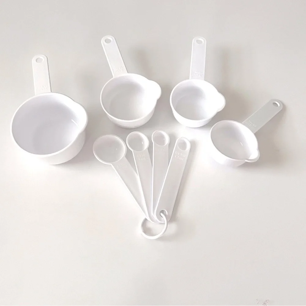 NWOT Set of 8 Pieces White Measuring Cups and Spoons